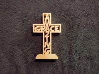 Amazing Grace cross on a black background